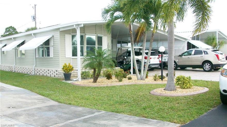 DO NOT MISS--YOU OWN YOUR LAND......-This unit has the best....2 bedrooms, 2 baths with front den.  Hardwood and ceramic flooring make up this as shown by pictures.....New metal roof in 2012, New air in 2012, New hot water heater in 2013, brick pavers three years old on drive, lanai and up side stairs which include railings on both sides(per seller)...To rear of carport is extra large shed 9X16, lanai is 9X24...Hurricane shutters on most windows, left side has storm shutters...There are two entrances(one side, other in den) which are steel doors, one with stained glass windows.....Four ceiling fans for that extra comfort and humidstat...And to make this more looking newer than its 1999 age, is the CORNERSTONE quality kitchen and both baths, including pantry in kitchen, counter tops, newer appliances; quality workmanship at its best...Nothing left to the imagination on this one...