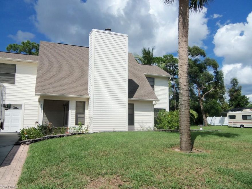 Two story single family home in El Dorado Acres.  Excellent location!  West of US 41 and close to Coconut Point Mall, Airport and  I-75.  This home has two bedrooms, two and a half bathrooms, living room with fireplace,  room off of kitchen can be used as dining room or living room or den.  There are fruit trees, shed, and garage that has been converted into office with window AC and storage.  This can be removed and converted back into a garage.  Easy to show, vacant on Supra!  There is room for your boat or motorhome on this property!!!!!