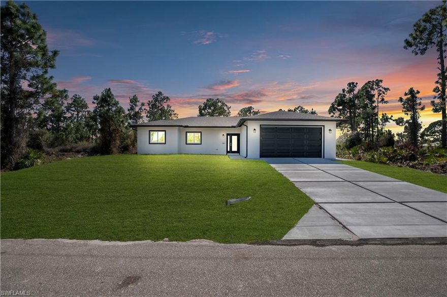 THIS IS NOT YOUR TYPICAL HOME IN LEHIGH ACRES.
Built with QUALITY CONSTRUCTION and attention to detail, this stunning property offers 4 BEDROOMS, 2.5 BATHROOMS, AND NEARLY 2,400 TOTAL SQ. FT. on a QUARTER-ACRE LOT. The home features an OPEN-CONCEPT LAYOUT with an EXPANSIVE COVERED LANAI, perfect for indoor-outdoor living.

The kitchen showcases HIGH-QUALITY CABINETRY, a WATERFALL ISLAND WITH TAJ MAHAL QUARTZITE (RARE TO FIND IN THE AREA), and elegant PENDANT LIGHTING. The same premium stone is featured in the bathrooms, adding a cohesive luxury feel throughout the home. Enjoy PORCELAIN TILE FLOORS THROUGHOUT, CUSTOM-BUILT CLOSETS IN ALL BEDROOMS, and a FULL LAUNDRY ROOM WITH CABINETRY.

Additional highlights include IMPACT WINDOWS AND DOORS, FRAMELESS GLASS SHOWERS, a 2-CAR GARAGE WITH SIDE ENTRY, and ALL APPLIANCES INCLUDED — INCLUDING WASHER AND DRYER.

Conveniently located NEAR SR-82, just MINUTES FROM FORT MYERS AND SOUTHWEST FLORIDA INTERNATIONAL AIRPORT, offering easy access to shopping, dining, and major routes.