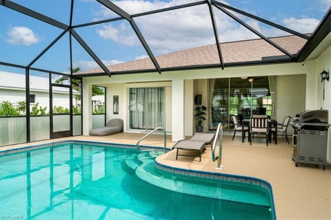 Photo of 8312 Tahiti RD, FORT MYERS, FL 33967 (MLS # 226027965)