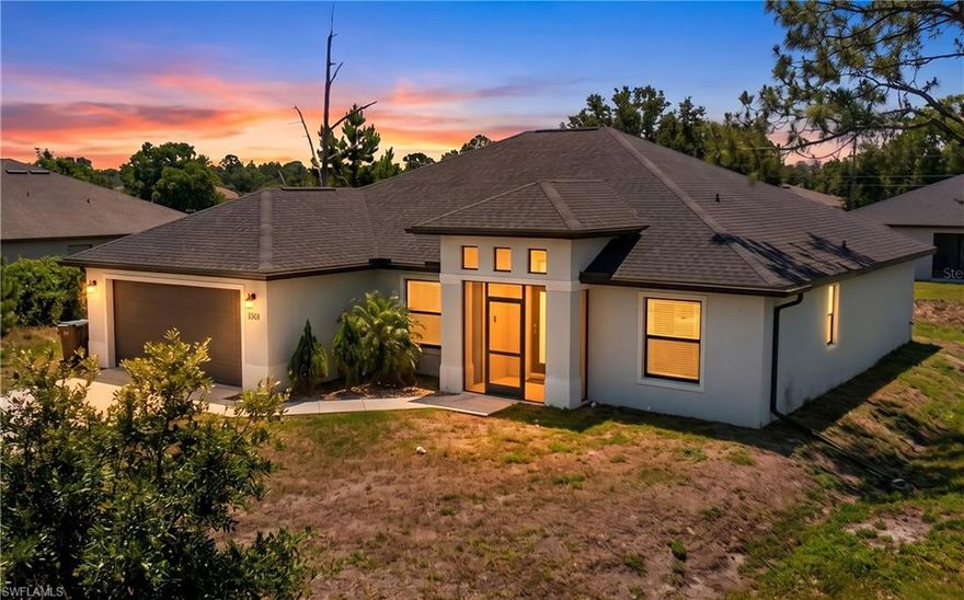 Welcome to your nearly new dream home in Lehigh Acres! Built in 2023, this modern 4-bedroom, 2-bathroom residence is truly TURNKEY, offering the perfect combination of contemporary design, energy efficiency, and low-maintenance living. Step inside to discover a bright, open layout filled with natural light, ideal for both relaxing and entertaining. The thoughtfully designed floor plan features spacious living areas and a seamless flow between the kitchen, dining, and living spaces. The stylish kitchen boasts modern finishes, ample cabinetry, stainless steel appliances, and plenty of room to gather. The split-bedroom design provides added privacy, with a comfortable primary suite with two walk in closets and luxury separate shower and tub. Generously sized secondary bedrooms perfect for family, guests, or a home office. The home also offers a spacious Den/Office flex room, vaulted ceilings, and wonderfully elegant light fixtures, along with a Washer/Dryer laundry room for added convenience. With newer construction, you’ll enjoy peace of mind knowing everything is up to date and move-in ready from day one. Step outside and imagine the possibilities! The spacious backyard offers plenty of room to add your dream pool, create an outdoor oasis, or design the perfect entertaining space. Located in a growing area of Lehigh Acres, you’ll enjoy a quiet setting while remaining close to shopping, dining, and everyday conveniences.
Don’t miss this opportunity to own a move-in ready, turnkey home with space to make it your own! Schedule your showing today!