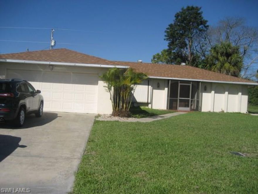 Cute POOL home with city water and sewer.  Roof was put on in 2009.  Split bedrooms, inside laundry, eat in kitchen, under cover lanai.  City water and sewer in and paid.  Split Bedrooms, undercover lanai, and 2-car garage.  Open living area that overlooks the pool.  Close to shopping,  and restaurants.