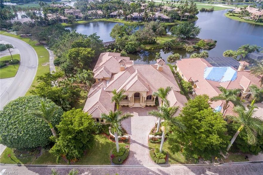This elegant estate has a timeless appeal and exceptional south-facing views to Banyan Island, the bridge, lake, and palm course fairway. In addition to the major price reduction, $50,000 is offered toward a Grey Oaks Country Club membership or remodeling. Luxurious surroundings include a 400-bottle wine cellar, spacious game room, media room, a kitchen fit for a master chef, fireplace in living room and lanai, two oversized garages for two cars, golf cart and a beautiful custom wood paneled executive office. Onyx, granite and marble grace the residence. Chinaberry is a cobblestone street community within Grey Oaks which recently completed a $30 million renovation including an extraordinary wellness center. The location couldn’t be better as Old Naples, the beaches, Naples Philharmonic, fine dining and shopping are a short drive away.