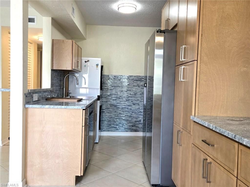 Photo of 4625 Bayshore DR #D1, NAPLES, FL 34112 (MLS # 226015896)