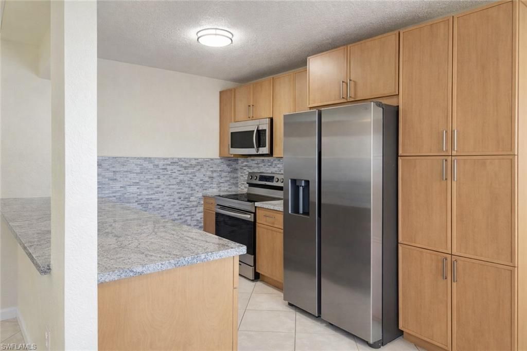Photo of 4625 Bayshore DR #D1, NAPLES, FL 34112 (MLS # 226015896)