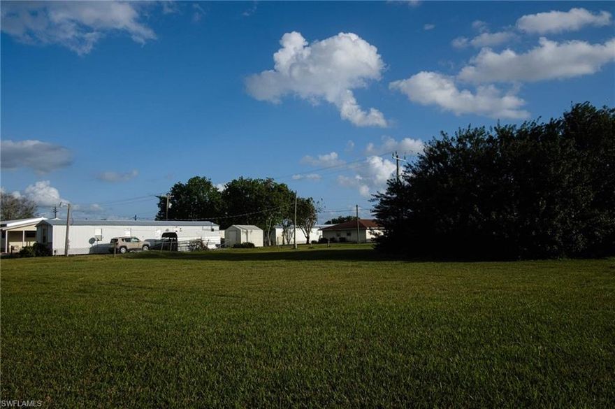 Vacant Land For Sale | Address: 798 Railroad Ave, Moore Haven, FL 33471 | Parcel Number: S11-42-32-003-0070-0080 | County: Glades | Size: 0.14 Acres | Legal Description: BLK 70 LOT 8 MOORE HAVEN DC PB 3 PG 72 | Terrain: Level | Zoning: R1 – Medium Density Residential | Camping and RV: No | Power: Power lines along North and South boundaries | Water: City Water | Sewage: Municipal Sewer - $2000 capacity fee sewer for new connections | Flood Zone: No – Zone X | Scrub Jay Zone: N/A | Annual Property Taxes: $181 | Access: Easement | Dimensions (Feet): 50 x 120 | HOA: None | Google GPS Corner Coordinates: NW: 26.835252, -81.101081 NE: 26.835254, -81.100928 SW: 26.834926, -81.101086 SE: 26.834926, -81.100936