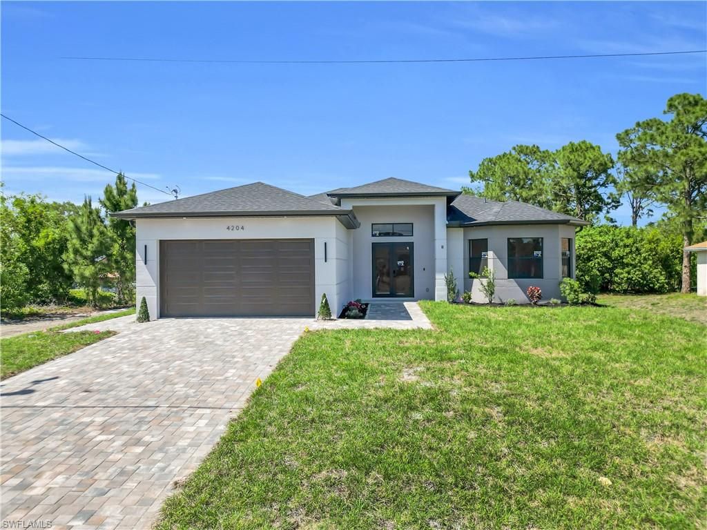 Photo of 4204 3rd ST W, LEHIGH ACRES, FL 33971 (MLS # 226020431)