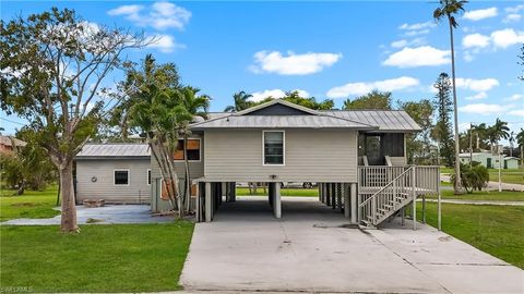 Photo of 301 Allen AVE, EVERGLADES CITY, FL 34139 (MLS # 226016653)