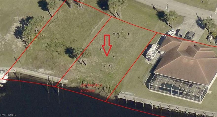 Build your Florida waterfront dream on this exceptional deep-water canal lot located in the desirable Fort Myers Shores community. Just minutes to the Caloosahatchee River with direct Gulf access and NO bridges, this property is a true boater’s paradise—perfect for powerboats and sailboats alike. Seawall installed in 2025 provides immediate value and peace of mind, making this lot ready for your custom home. Enjoy watching the dolphins and manatee as they swim in the deep water canal in your back yard. Beautiful views of the water with the intersecting canal leading you to the Caloosahatchee River . Quick access to open water for fishing, cruising, and sunset adventures. A true boaters paradise!! Whether you’re planning a full-time residence, seasonal retreat, or investment build, this prime  waterfront location offers endless possibilities and the ultimate Southwest Florida lifestyle. Property Highlights: Deep-water canal with sailboat access, Direct Gulf access – no bridges, Minutes to the Caloosahatchee River, New seawall (2025), Cleared lot ready to build on. Close to I75, shopping centers, National parks, and schools. Opportunities like this don’t last—secure your place on the water and start living the Florida dream today.
