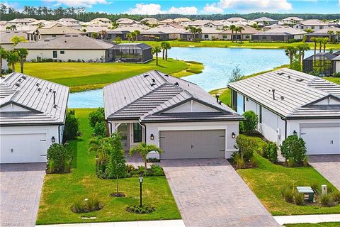 Photo of 20593 Pebble Glen DR, ESTERO, FL 33928 (MLS # 226016919)