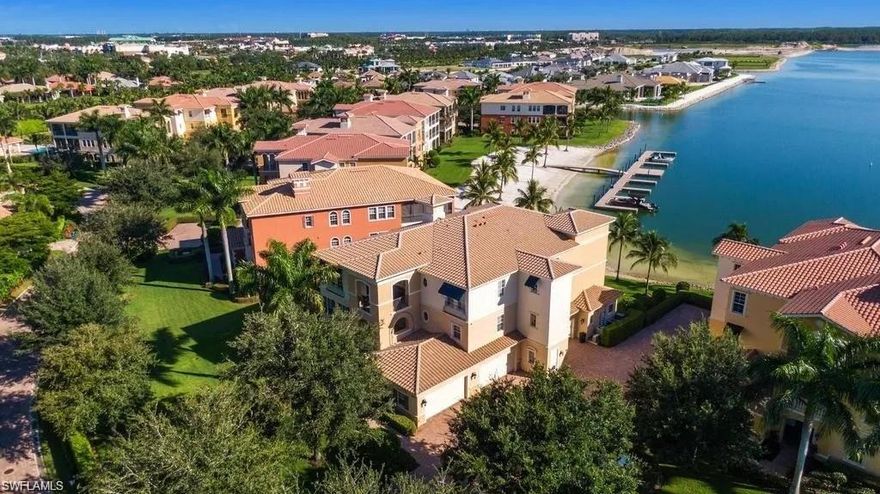 Experience the pinnacle of luxury living in this stunning 3-bedroom plus office/den, 3.5-bath penthouse in Bellini at Miromar Lakes Beach & Golf Club. Completely updated throughout, this exceptional residence offers an elegant and sophisticated design with tray ceilings, expansive living spaces, and a private elevator for ultimate convenience and privacy. The spacious, open layout flows seamlessly to an oversized screened lanai featuring a fully equipped outdoor kitchen, the perfect setting for entertaining or relaxing while enjoying beautiful lake views. Every detail of this penthouse has been thoughtfully upgraded, creating a light, bright, and refined living environment. The home also includes the rare convenience of a private 2-car garage. Residents of Miromar Lakes Beach & Golf Club enjoy an unparalleled five-star resort lifestyle. The community is centered around a spectacular 700-acre freshwater lake offering boating, water-skiing, kayaking, fishing, and swimming. Additional amenities include a championship golf course, seven Har-Tru tennis courts, three waterfront restaurants, a full-service European-style wellness spa, state-of-the-art fitness center, a 10,000-square-foot zero-edge infinity pool, and three miles of pristine white sand beaches. This extraordinary penthouse combines luxury, privacy, and resort-style living in one of Southwest Florida’s most sought-after communities.