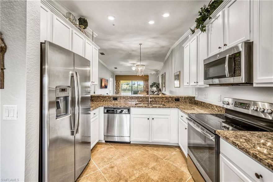 Treviso Bay SOCIAL MEMBERSHIP included! Enjoy resort-style living in this 2nd floor Veranda condo in the beautiful Avellino subdivision of Treviso Bay. Sip your morning coffee on the front lanai and enjoy your favorite happy hour beverage on the back lanai overlooking your private lake view. This "Bromelia" floor plan is being sold Furnished (w/ exclusions) and offers 2 bedrooms, 2 baths, plus a spacious den that provides lots of living space. Kitchen includes granite countertops throughout and beautiful 42" upgraded white cabinets. The home has a 1-car garage that is also perfect for extra storage space. Avellino also has its own private pool and pickle ball courts for its residents just steps away! Treviso Bay offers Florida resort-style living with pickle ball, tennis, bocce, a state-of-the-art fitness center, walking paths, exquisite clubhouse dining, card rooms, and a swimming pool with waterfall and lap lanes. Enjoy the hot tub, saunas, on-site Spa, and social atmosphere at the pool bar and grill. Social members are also allowed golf privileges on the TPC course May-October.