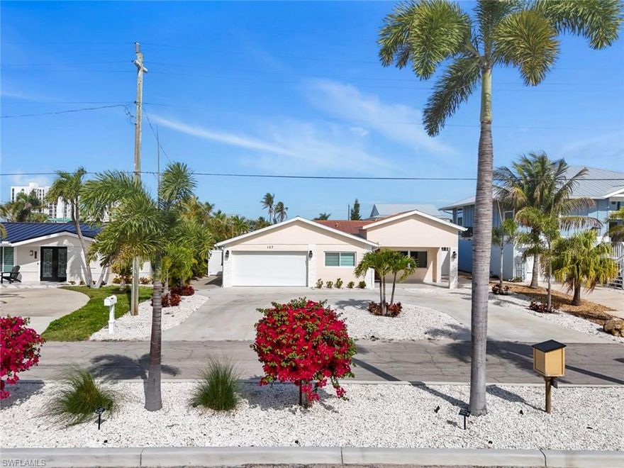 Stunning Waterfront Home with Gulf Access - New Upgrades and freshly painted inside - Enjoy the ultimate Florida lifestyle in this beautifully remodeled, concrete block home featuring direct Gulf access—perfect for boating enthusiasts! Ideally located across from beach access, this move-in-ready property offers both luxury and convenience. This spacious home includes 3 bedrooms, 2 bathrooms, and a 2-car attached garage, all thoughtfully updated from top to bottom. Step outside to your brand-new heated saltwater pool and expansive lanai—ideal for relaxing or entertaining year-round. Highlights include: • New 10,000 lb boat lift and remodeled dock • Fully updated kitchen with granite countertops, wood cabinetry & new appliances • Completely renovated bathrooms • New electrical, plumbing, drywall, and interior doors • storm shutters, New front door & impact garage door • New AC system + all-new ductwork • Foam insulation in attic and walls for energy efficiency • Tile flooring throughout • Inside laundry with washer & dryer • New circular driveway for added curb appeal. Located in a quiet, highly desirable neighborhood, just minutes from top restaurants, shopping, and coastal attractions. This home truly has it all—just bring your boat and move right in!