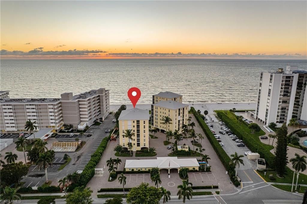 Photo of 3483 Gulf Shore BLVD N #105, NAPLES, FL 34103 (MLS # 225076501)