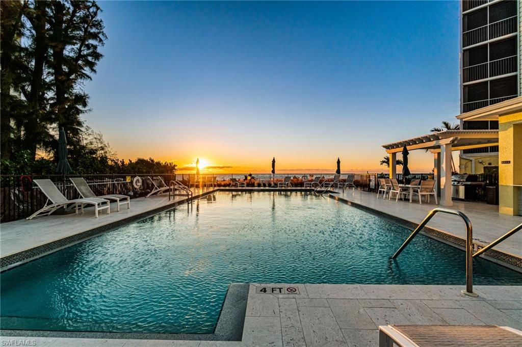 Photo of 3483 Gulf Shore BLVD N #105, NAPLES, FL 34103 (MLS # 225076501)