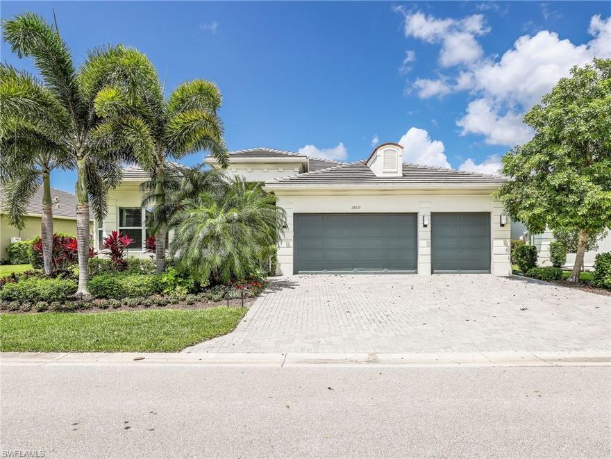 Experience luxury lakefront living in the highly sought after 55+ community of Valencia Bonita in beautiful Bonita Springs. This highly desirable Julia model offers 3 bedrooms plus a den, 3 full bathrooms, 1 half bathroom, and a spacious 3 car garage, combining elegant design, thoughtful upgrades, and exceptional indoor outdoor living. Positioned on a peaceful pond lot and located just moments from the community clubhouse and resort style amenities, this home delivers the lifestyle buyers are searching for.

Grand dual front doors and impressive curb appeal create a striking first impression before stepping into an open concept floor plan filled with natural light and spacious gathering areas. Tile flooring runs throughout the main living spaces, complemented by a formal dining room and an expansive great room designed for entertaining, hosting guests, or simply enjoying everyday comfort. Recessed lighting in both the front and rear of the home adds a refined ambiance inside and out.

Designed with both functionality and entertaining in mind, the kitchen offers an exceptional amount of workspace and storage rarely found in comparable homes. An oversized island provides dedicated areas for preparation, and serving while the breakfast bar provides extra countertop space and seating. Extensive cabinetry, generous countertop space, under cabinet and above cabinet lighting, a gas stove and oven, and a bright breakfast nook overlooking the water complete the space.

The spacious primary suite offers peaceful pond views, a large walk in closet, and a well appointed ensuite bathroom featuring dual vanities, a soaking tub, and a separate walk in shower. Guest bedrooms are privately situated and generously sized, while the den provides flexibility for a home office, media room, fitness space, or additional guest accommodations.

The lanai is currently being extended with construction scheduled to be completed prior to closing, creating an even larger outdoor living area ideal for relaxing, dining outdoors, or enjoying the tranquil waterfront setting. Additional peace of mind comes from the recently replaced HVAC system completed within the last 5 months.

Valencia Bonita offers an active lifestyle centered around a spectacular clubhouse, resort style pools, fitness center, pickleball and tennis courts, on site dining, social events, and a full calendar of activities within one of Southwest Florida’s premier gated communities.