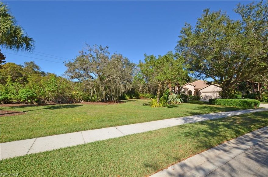 Possibly the largest lot in Autumn Woods - over 14,000sf of exotic and lush landscaping providing privacy and serenity with a view of the lake behind. Open concept living with volume ceilings. Original owners completely remodeled interior in 2015 with 19" seamless grout Daltile Leather Vernada Collection flooring throughout, Vetrazzo Emerald Coast countertops in kitchen, baths and laundry room; glass subway tile backsplash; sleek Moen 90 Degree collection of kitchen and bath fixtures. Ultra violet air purification added to HVAC system to eliminate molds, pollens and air-born particulates. At the end of the day, enjoy the private outdoor lanai and in ground spa with sheer decent waterfalls, sea glass tile and upper planter. Autumn Woods is a 24 hour gate attended community set among 20 lakes and 26.5 acres of natural preserves and walking paths througout. 2 community pools, heated spa, lighted tennis courts, basketball court, playground and fitness facility. Beach, dining and night-life close. Water heater replaced in 2014; digital heat pump on spa installed in 2015.