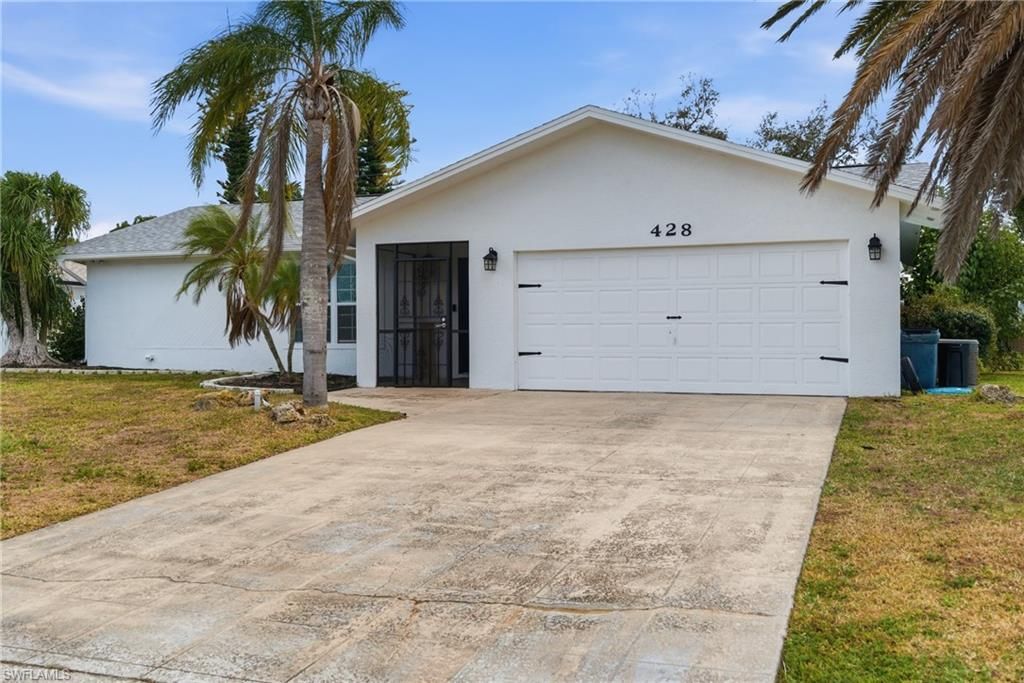 Photo of 428 SW 33rd TER, CAPE CORAL, FL 33914 (MLS # 226005178)