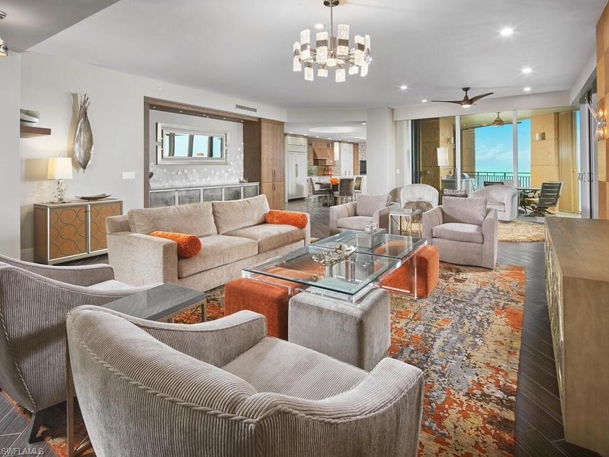 Highly desirable ’04 Cozumel residence boasts the most luxurious, completely updated interior.  Rarely available and sought after – this 4 bedroom, 4 bath beachfront residence has everything the discriminating buyer desires, including a private 2 car garage.  Upon entering, you will be immediately captivated by the sweeping views of the sparkling Gulf waters and Marco’s world-famous white sand beach.  Not to be outdone by the outstanding views, the gorgeous interior offers tile flooring throughout the main living space, thoughtful details throughout, custom built-ins, custom lighting, and so much more.  The dining room has been opened to the kitchen to enhance the already dramatic views.  The kitchen is a masterpiece complete with high-end appliances, custom cabinetry, and large center island with waterfall edge.  The dramatic floor to ceiling windows in the kitchen are the perfect place to take a seat, enjoy a cup of coffee or a cocktail, and relax while watching waves roll in and dolphins play.  The master suite is a private oasis complete with a large private balcony.  The en-suite bath offers a spa-like, serene atmosphere with walk-in shower, jetted tub, custom cabinetry, and beautiful tilework.  Guests will appreciate the 3 additional bedrooms, 2 of which offer en-suite baths.  With 3 balconies total, this beachfront home boasts ample outdoor living space.  Enjoy the best view available on the beach and magnificent year-round sunrises and sunsets.  The spacious beachfront balcony, off the main living area, provides the perfect place to entertain guests with multiple seating areas and summer kitchen.  Or, enjoy a quiet moment to yourself relaxing in the fresh salt air while feeling the gentle island breeze.  Experience an extra layer of security and peace of mind from the brand new hurricane shutters installed just last week.  Cape Marco and Cozumel offer many fine amenities including an elegant lobby, beachside social room, fitness center with amazing beach views, billiard room, card room, pool, spa, Har-Tru tennis courts, convenient beach access, guarded gate entry, and more.  Enjoy the Cape Marco lifestyle, where luxury is a standard.  Do not hesitate to make this coveted beachfront home your private island oasis.