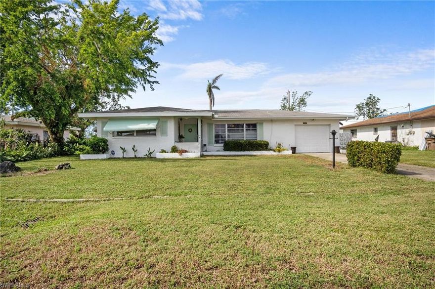 All the Charm and picturesque are in this 3bd/2bath/1 car garage 1063 sq ft fenced-in single-family home about a mile and a half away from the BEACH, in the heart of downtown Cape Coral with updates to maintain the quaint Florida comfort! Features granite countertops, 2012 roof, 2020 water heater, A/C, Terrazzo flooring, ceiling fans & plantation shutters throughout, washer/dryer, separate outdoor private entrance to en-suite, and furniture is negotiable. Just move right in, walk or bike to the beach or downtown or enjoy gatherings by your built-in outdoor fireplace in your private courtyard with ample space for a pool!  All assessments are paid. This loving home awaits your arrival!