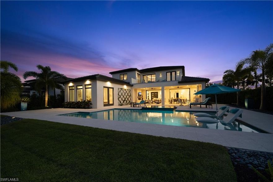 Picture a secluded, private 22 home community nestled between the Gordon River, Greenway and Jack Nicklaus Signature Golf Course convenient to everywhere in Naples. Inside the Landings at Bear's Paw this 4,960 square foot, 4 bedroom, 4 1/2 bath home with deeded dock was meticulously planned for 3 years. From the European Oak Floors, Floating Staircase, and Spectacular Wine Display Wall up to the "Smart Home" Lutron Lighting plus Custom Omega Cabinets every detail was selected to enhance the open, flowing floor plan. The lanai, with outdoor kitchen, phantom screens and pocket sliding doors introduces the sun shelf saltwater pool with spillover spa to an endless all
backyard. The large first floor Master Suite provides the convenience of "ground floor" living while three comfortable bedrooms and second floor entertainment room offer generous accommodations for family and friends. This stunning dream home must be seen to be appreciated.