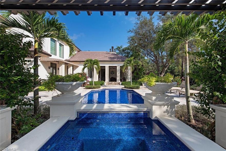 IMMEDIATE GOLF MEMBERSHIP AVAILABLE.  This custom estate home situated on an oversized 1.34 acre home site in Il Corsini at Mediterra was built by Kurtz Homes with a perfect combination of superior quality, elegance and comfort. A rare 300-foot driveway brings you to a gated motor court with a 5-car garage. Exterior painted December 2018. Main interior living areas painted February 2019.  Elegant features inside and out include a gourmet kitchen, two fireplaces, electric outdoor screens inside the columns, a Mahogany paneled study, extensive landscaping, custom pool and spa with pergola.  Don’t miss the 2nd floor expansive recreation room with billiards and a tiered 14 seat home theater as well as 2 ensuite bedrooms. Guests can enjoy extra privacy in the detached cabana suite with separate entrance, living room and full bath. The outside entertainment area takes full advantage of the long golf course views. The exclusive Mediterra Golf & Beach club offers multiple levels of membership. $16M clubhouse renovation completed November 2019. Buyer to assume CDD.