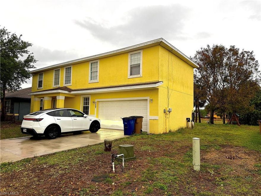Take a look of this amazing 4 Bedroom 2.5 Bath plus a Den/room, located in the beautiful and quiet Shadow Lake Community of Lehigh Acres, FL. This 2-story house is a perfect blend of style and comfort, featuring an open floor plan that allows for seamless transitions between spaces with a Den/Room that give you the choice to be used like game room or an office or another ques room and also you will have a half bath right in the entry level. The raised ceilings add a touch of elegance and create a sense of spaciousness. The kitchen is equipped with modern stainless steel appliances, ready to inspire your culinary adventures. Almost each space of the house is fitted with ceiling fans, ensuring a comfortable atmosphere throughout the year. The huge backyard offers a outdoor space for relaxation or entertaining. This house and this community is the perfect spot for relaxing and enjoy the year around nice weather of the Florida.