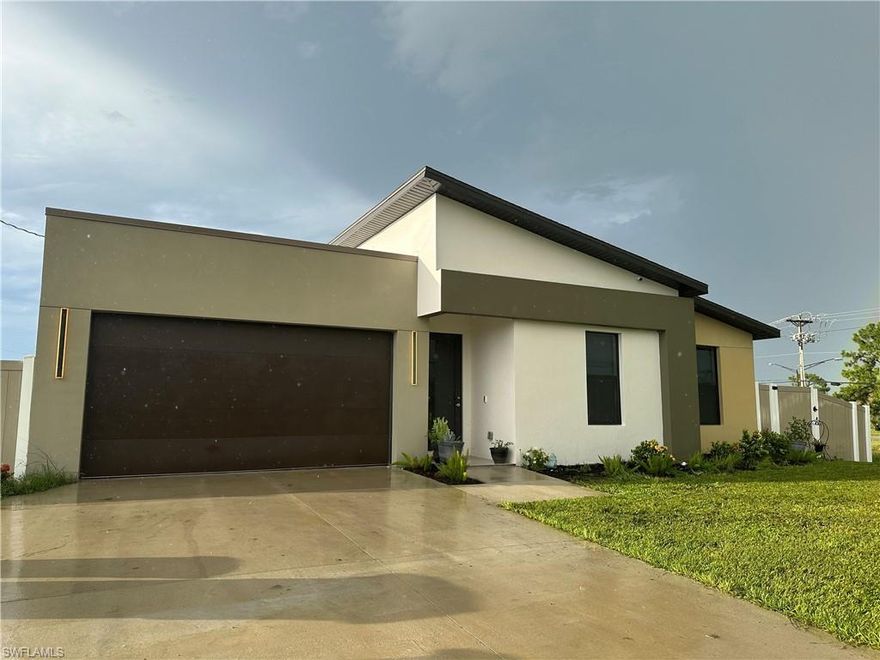 THIS IS A SHORT SALE SUBJECT TO BANK APPROVAL AND THE OWNERS ARE IN ACTIVE SHORT SALE PROCESS WITH THE LENDER - THIS PRICE HAS BEEN APPROVED. HOME MUST BE MARKETED FOR 15 DAYS PRIOR TO SELLER ACCEPTANCE PER LENDER REQUIREMENT.  GREAT OPPORTUNITY! This modern style 4-bedroom 3+bath home with beautiful interior offers all the latest trends in building design. This MG-18 model has a glass door with a large and bright entrance. Impact hurricane windows, freshly painted walls in the interior of the home that add a very complimentary color design. From the modern outside to the stunning designs of the bathrooms; this modern home is a stunning find. The home is a 1/4 acre lot on a corner lot so currently no surrounding neighbors directly next to the property. The property has a spacious backyard with a fence already built in. Built 2023, impact glass windows, NO FLOOD ZONE. All offers to include pre approval or proof of funds and short sale supplements. This dream home can be yours!