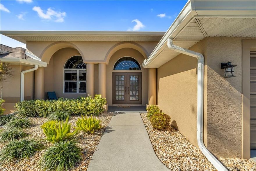 Welcome to your dream home retreat in the heart of Cape Coral. Nestled in one of the community’s most desirable and picturesque neighborhoods, this beautiful home offers the perfect blend of relaxation, comfort. Whether you’re searching for a peaceful getaway or a place to enjoy year-round living, this property delivers an exceptional lifestyle where tranquility and convenience come together effortlessly.
This home offers the serenity of a quiet community while remaining just minutes from top-rated schools, shopping, dining, and endless recreational opportunities.

Designed for everday comoft and living this home wleomces you with three bedrooms, two bathrooms, and a three-car garage, this thoughtfully designed home provides generous space for both everyday living and entertaining.  The kitchen showcases grantie countertops and overlooks the rear  heated pool area.  High ceilings and expansive windows fill the home with natural light, creating a bright, open, and welcoming atmosphere throughout.  The king size primary suite bedroom boosts a walk in closet closet , jacuzzi tub, shower and views of the pool. 
Step into your own backyard paradise. The cozy enclosed lanai with pocket sliding doors and windows creates a seamless indoor-outdoor living experience. Relax on the spacious patio, host unforgettable gatherings surrounded by lush gardens, or take a refreshing dip in the sparkling pool—perfect for soaking up warm Florida days.
Recent upgrades are full exterior painting in 2022, new roof and new gutters 2023 upgraded applainces 
The attached three-car garage offers ample room for vehicles, tools, and recreational equipment, providing both convenience and abundant storage. Enjoy peace of mind with reliable city utilities,  and irrigation making daily living truly hassle-free. Don’t miss this incredible opportunity to own a slice of paradise. Schedule your private showing today and experience the charm, comfort, and convenience of Cape Coral living.
Your dream home awaits.