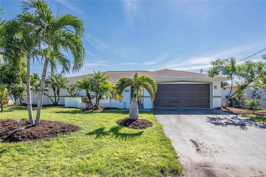 Canal front living at its best! Don't miss seeing this custom renovated 4 bedroom 2 bathroom, 2 car attached garage single family home.   A very peaceful and private setting awaits you as you enjoy sitting on your over-sized tiled screened lanai or grab your poles and fish from your back yard.  This special home features vaulted ceilings, kitchen with granite, stainless steel appliances and custom cabinetry with ceramic tile flooring throughout the home.  All new appliances including a new washer and dryer!  Each room has lots of natural light and the open concept floor plan is great for family living.  Quiet neighborhood within walking distance to schools, parks and shopping.  Best of all, NO HOA fees or pet restrictions!