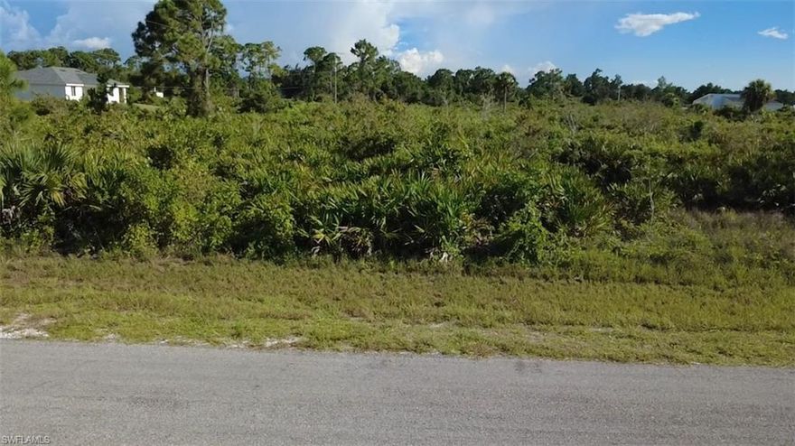 Excellent lot, 025 acres 104x105. Paved road with pole light. Many new construction around.