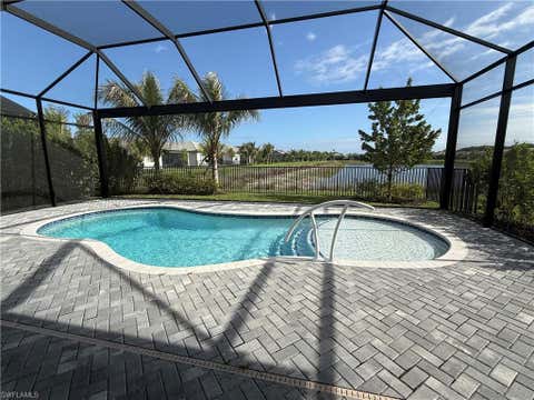 Photo of 12436 Purple Ficus WAY, NAPLES, FL 34120 (MLS # 226023335)
