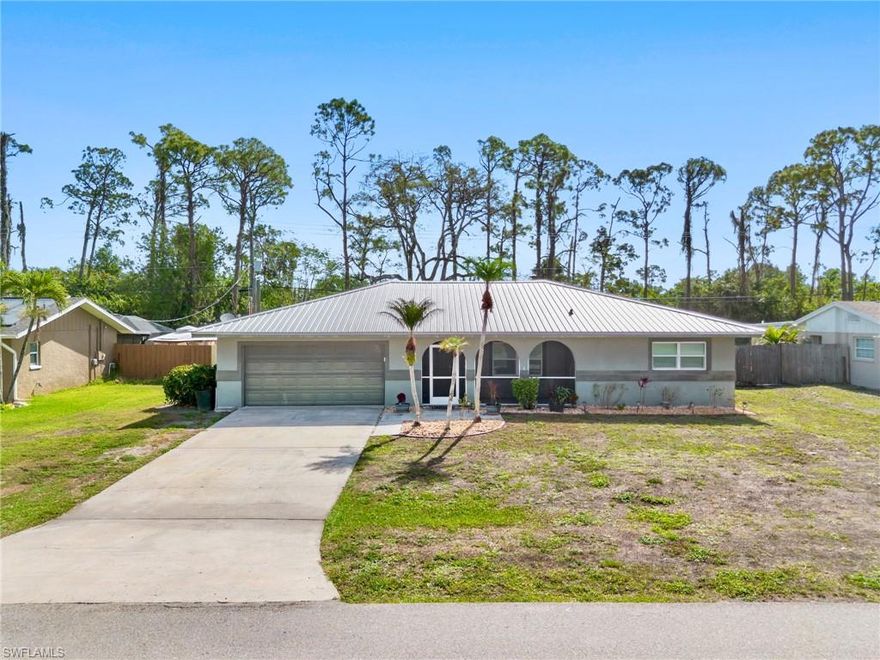 Beautifully located in the heart of South Fort Myers, this 3 bedroom, 2 bath pool home sits in the desirable Fort Myers Villas community. Features include updated LV flooring, crown molding, a spacious split-bedroom layout, and a large great room ideal for everyday living and entertaining. Enjoy one of the most expansive private fenced backyards in the neighborhood, complete with a resurfaced pool and newly expanded tile deck. Additional upgrades include a 2022 metal roof. No HOA fees. The property backs up to the John Yarborough Linear Park, offering added privacy and the assurance of no future rear construction. Move-in ready and perfectly situated close to shopping, dining, and beaches.  You are now HOME!