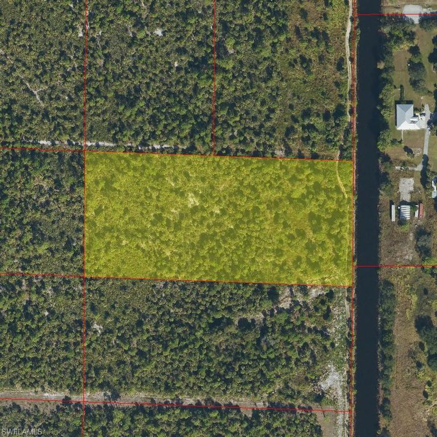 Exceptional opportunity to own 5 acres of 100% uplands with agricultural and residential zoning and desirable canal frontage. This property is being sold together with the adjacent parcel (PID 00319880005 ) for a total of 10 acres.