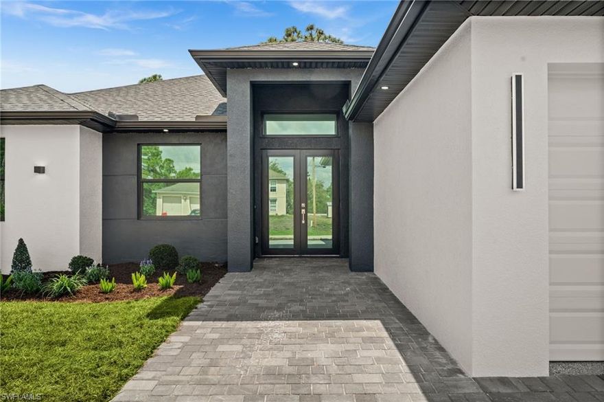 *HELP TOWARDS CLOSING COSTS AVAILABLE*** READY TO MOVE IN!!! Spacious open floor plan with 3 bedrooms + Den, 2-full bathrooms and 2 cars garage, home spans 2,005 sq ft. Hurricane impact windows and doors. Home features a state-of-the-art kitchen equipped with stainless steel appliances, high-quality cabinetry, quartz countertops and backsplash, and a waterfall edge island. The master suite offers comfort with the spacious master bathroom providing an elegant retreat with a double sink vanity and a frameless glass shower. Imported oversize porcelain flooring, dual walking closets and lofty ceilings flow throughout, elevating the modern feel of the property. Blending modern design with high-end finishes. Outdoors a beautifully landscaped garden with a covered lanai. The driveway goes all the way down to the double garage entry door. This street offers peace and quiet along with added safety for the family. This house is a great choice for anyone looking for a harmonious blend of modern design and comfortable living. This property is just what you're looking for. Don't miss the opportunity to own this beautiful property. Make this your dream home now. Ready to move in !!! Enjoy an outstanding home that perfectly combines comfort and luxury!!!!