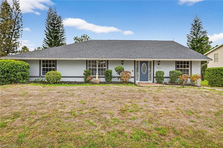 Looking for a true unicorn in Lehigh Acres? You’ve just found it! This one-of-a-kind property is the perfect blend of comfortable living and serious workspace—designed for entertaining, hobbies, and anyone who dreams of having the ultimate garage setup.
Step inside to a spacious, recently updated interior that feels warm, open, and inviting. The comfortable kitchen flows seamlessly into the dining and living areas, creating the perfect layout for hosting friends and family. Large sliding doors lead out to a covered lanai, extending your living space outdoors and making indoor–outdoor entertaining effortless. 
When it’s time to unwind, retreat to the massive primary suite featuring a cozy sitting area and a spa-like bathroom designed for relaxation after a long day. This private space truly feels like your own personal getaway.
Now for the showstopper: the mechanic’s dream garage. Tucked behind the home is a huge 25’ x 50’ main garage/shop complete with its own 3.5-ton separate A/C unit and a 10,000-pound car lift—making this setup ideal for car enthusiasts, hobbyists, business owners, or anyone who simply loves space to create, it’s perfect for working in comfort year-round.
Outside, the property truly sets itself apart. A custom-designed automatic gated entrance provides an added layer of privacy and security rarely found in the area, while also framing the home beautifully. Beyond the gate, you’ll find an oversized, expanded driveway with ample room for guests, trailers, toys, and ongoing projects—no parking stress and no compromises. This thoughtfully designed exterior setup was customized specifically for the property, offering both everyday convenience and peace of mind.
Recent upgrades add even more value and peace of mind, including a new roof, newer A/C (2019), new flooring throughout, updated fixtures and lighting, fresh paint, new hardware, sinks, toilets, hot water heater, and water system. The home is also wired for a future whole-house generator, giving you the option to expand even further.
This is more than just a home—it’s a lifestyle. Whether you’re an entertainer, a mechanic at heart, or someone who just wants something truly unique, this Lehigh Acres unicorn delivers. Homes like this don’t come along often—don’t miss your chance to make it yours!