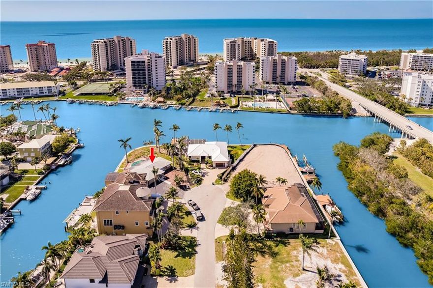 Location, Location, Location!!!  Here is your opportunity to build your dream home on one of the best waterfront, gulf access lots in all of Naples.  This lot sits on a quite cul-de-sac, offers Southwest exposure, and 191 feet of water frontage which features a unique boathouse that can be incorporated into the new home plans.  Flamingo Ave features the shortest boat ride to the gulf of all of the streets located in the prestigious neighborhood of Conners.  Ideally located near the world-class Ritz Carlton Resort, LA Playa, Mercato, Waterside Shops, Vanderbilt Beach, Delnor Wiggins State Park, as well as many other shopping and dining venues!  Don't miss out on amazing opportunity.