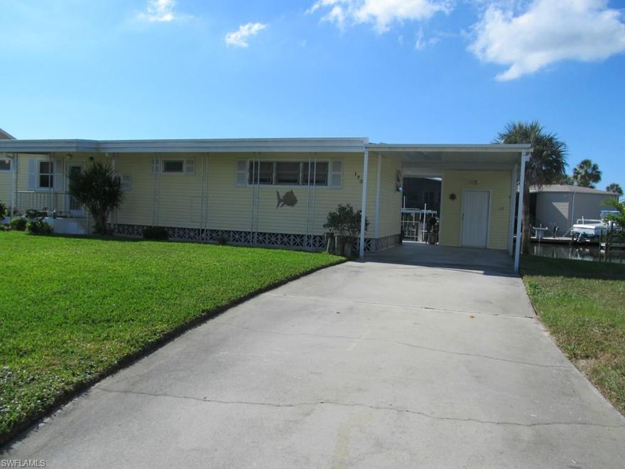 This Bayside Estates home is on a premium lot with a beautiful sunset view over a wide canal. It is a 2 bedroom, 2 bath home, with a popular split bedroom floor plan. The home is very nicely furnished, and has direct gulf access. Be out to the gulf in 1/2 hour or less! Yet, stay out of the beach traffic in season. Convenitenlty located near both FT Myers Beach and Sanibel. Buyers in Bayside Estates have a $1600 resale capital contribution fee.