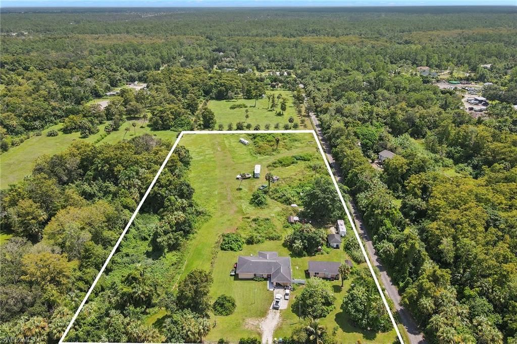 Photo of 2120 Rock RD, NAPLES, FL 34120 (MLS # 226015107)