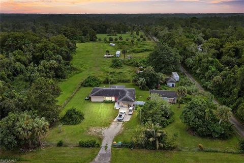 Photo of 2120 Rock RD, NAPLES, FL 34120 (MLS # 226015107)