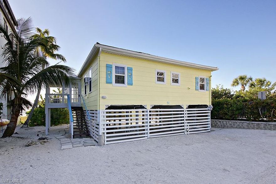 It's all about LOCATION in real estate and this Prime beachfront home has the best location on the beach.  Nestled between the Diamond Head Resort and Surf Song Condos, this Gulf front 2 bedroom 1 bathroom home has hardwood floors giving it a wonderful beach bungalow feel.  Tropical foliage provides privacy to this beachfront home.  Lot size is approximately 50 feet wide by 200 feet deep.  Compare to home next door listed (and pending) at $2,325,000. Property is an easy 5 minute stroll down the beach to Times Square for fresh Gulf seafood, Asian, Greek, German, ice cream shops, live music and our famous sunsets over the Gulf of Mexico! The possibilities with this property are endless.  This is a rare find on Fort Myers Beach, don't miss out!