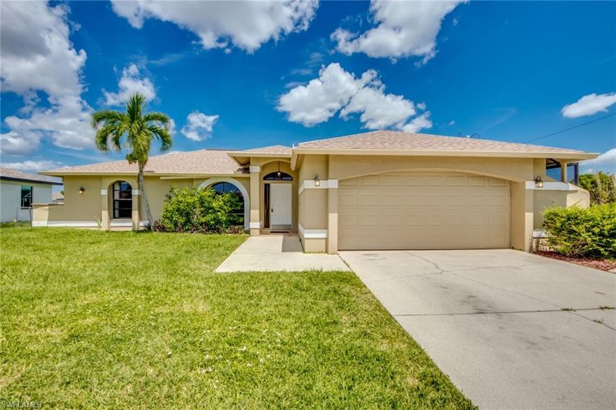 Wonderful SW area with many new luxury homes.  3 bedroom, 2 bath in move in condition.  Huge lanai and fenced yard.  Don't missed screened in area off of the garage.  Roof new in 2022, AC new 12/2018.  Close to shopping, Cape Harbour and Tarpon Marina. SELLER FINANCING AVAILABLE at full price @ 5.5%, 30 YEAR AMORTAZATION, 20% DOWN, FOR 5 YEARS WILL ALSO CONSIDER AN ANNUAL RENTAL AT $2200.