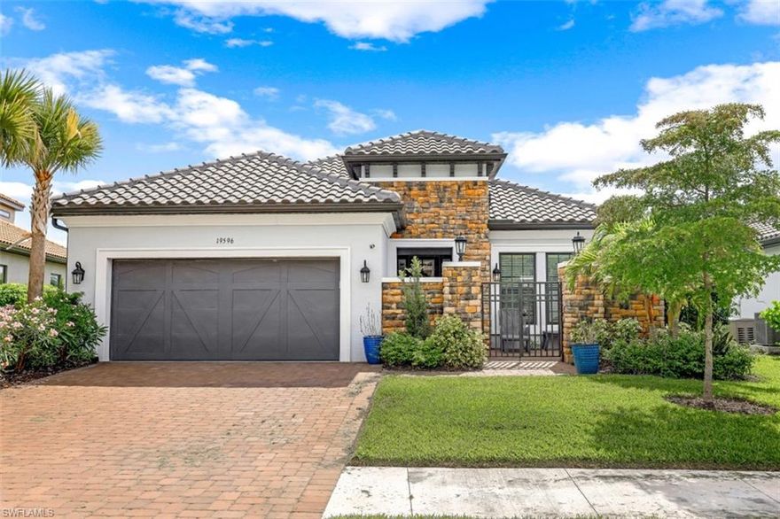 Built by the famous Taylor Morrison in the natural gas community of Estero Pointe. This recently built Lazio floor plan shows like a model home and is LOADED with upgrades! The moment you walk into this home you will notice the luxury design throughout the entire home. The home has a complete open floor plan and boasts high end stainless steel appliances and natural gas stovetop with quartz countertops combined with LVP flooring gives an elegant vibe. Enjoy your outdoor oasis with a full screened in pool & spa combined with a full outdoor kitchen. Striking panoramic views over the beautiful lake with direct western sunset views giving you the most desired indoor/outdoor living. Also completely protected by impact windows! Estero Pointe is a fully gated community with 64 homes. Located minutes away from the best shopping in Southwest Florida (Coconut Pointe), near multiple beaches, and 20 minutes to the international airport. This home really has it all!