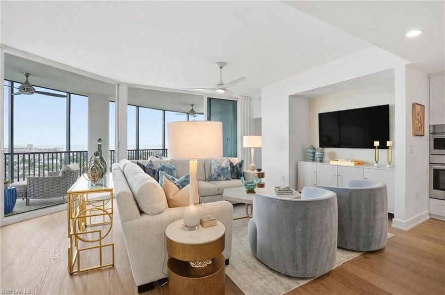 Experience elevated coastal living in THE penthouse residence at Grandview, the crown jewel of the final tower in the prestigious Waterside community by London Bay. Commanding the 9th floor, this exceptional 4-bedroom, 3.5-bath penthouse spans 2,767 square feet and offers breathtaking, unobstructed panoramic views of the Gulf of Mexico, Estero Bay, and protected nature preserves.

Professionally decorated and furnished by Clive Daniel, the residence is offered fully furnished and move-in ready, featuring high-end furnishings, premium linens, dishware, cookware, upgraded hardwood flooring, Bosch appliances, and motorized window shades—delivering a seamless luxury experience from arrival. A private elevator opens directly into the residence, unveiling an elegant foyer and an expansive open-concept layout designed to maximize natural light and showcase the extraordinary views.

Floor-to-ceiling windows frame dramatic coastal scenery from sunrise to sunset, while the expansive balcony provides an ideal setting for outdoor dining, entertaining, or quiet moments overlooking the water. The gourmet kitchen blends refined style with functionality, offering sleek cabinetry, premium appliances, and a layout well-suited for both everyday living and hosting.

Grandview offers an exceptional suite of resort-style amenities, including a state-of-the-art fitness center, yoga studio, resort-style pool and spa, and beautifully designed indoor and outdoor gathering spaces with cooking areas and fire features. Additional conveniences include secured parking, enhanced building security, private elevator access, and an elegant guest suite available by reservation.

The broader Waterside community elevates the lifestyle further with tennis courts, bocce, newly added pickleball courts, a putting green, and scenic walking paths throughout the former golf course. Deeded beach access places the white-sand shoreline of Fort Myers Beach just minutes away.

Ideally located on the coveted south end of the island, this penthouse offers walkability to Santini Plaza for shopping, dining, farmers markets, and entertainment, along with close proximity to Lovers Key State Park. The new South End Bridge provides easy access to Bonita Beach, Naples, and surrounding coastal destinations. Boat slips may be available for purchase or lease within Waterside, offering direct access to Estero Bay and the Gulf of Mexico.

Whether envisioned as a seasonal retreat or a year-round residence, this one-of-a-kind penthouse delivers an effortless lock-and-leave lifestyle, commanding views, and refined coastal luxury in one of Fort Myers Beach’s most desirable communities.