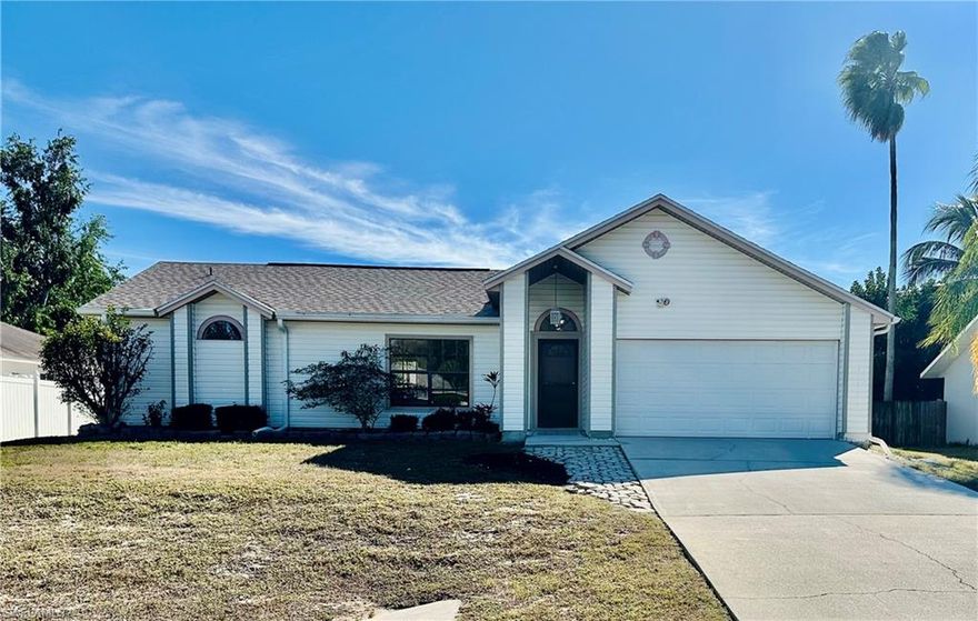 NO HOA! NO FLOOD ZONE!! EXCEPTIONAL VALUE- offered below recent appraised value. DON’T MISS OUT on this lovely spacious 3 bedroom, 2 bath home situated on a large fenced backyard and room for a pool. As you enter through the front door, you are greeted by a welcoming living area that is connected to the formal dining room. The family room boasts vaulted ceilings adorned with a charming plant shelf and sliding doors to the large lanai that bathes the room in natural light. The fantastic open kitchen has a breakfast bar, perfect for both meal prep and casual dining. The adjacent dining area, offering serene views of the private backyard—a perfect spot for family meals and entertaining. The generous primary suite is designed with comfort in mind, a walk-in closet and an en suite bathroom complete with a step-in shower and vanity. It has sliding doors that allow for natural light from the spacious lanai. Two additional bedrooms and a guest bathroom are located on the opposite side of the home, ensuring added privacy. The screened lanai is ideal for entertaining friends, while the fenced backyard provides a safe haven for kids and pets to play. The roof was replaced in 2023, water heater in 2025 and A/C in 2017. Conveniently located near SWFL International Airport, Fort Myers Beach, Florida Gulf Coast University, Gulf Coast Town Center and Hertz Arena, this home is perfectly positioned for both family living and investment opportunities. Community parks as well as a community pool are close by. Call today for your personal tour and experience the charm and comfort of this beautiful home firsthand.