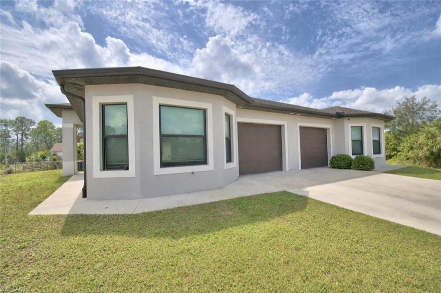Built in 2023, this exceptional duplex blends modern design with everyday functionality, offering two beautifully appointed 3-bedroom, 2-bath residences. Each unit showcases open-concept living, contemporary finishes, and a bright, polished interior designed for both comfort and style. With its clean lines, newer-construction appeal, and flexible ownership potential, this property is well suited for those seeking an elegant income-producing asset or a sophisticated multi-residence living opportunity. Conveniently located in Lehigh Acres near shopping, dining, and major roadways.
