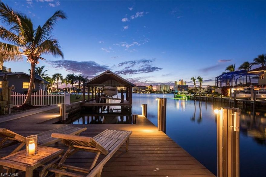 Location, location! Calling all boaters and water lovers! You can either navigate your boat effortlessly to the Gulf of Mexico or dock your water toys and enjoy your large “maintenance free” dock! In the morning sip your coffee and watch the playful dolphins swim by, and then later in the day, enjoy your favorite beverage and catch a beautiful Naples sunset. From this 3 bedroom, 2 bathroom home you can enjoy the most gorgeous views! Private, well manicured and landscaped, this waterfront property, which is almost directly on the bay, is situated on a quiet cul de sac in the Conners neighborhood of the Vanderbilt Beach area. The open concept kitchen has stainless appliances, granite counters, and an eat in area with a bay window overlooking the pool, dock, & bay. Large neutral tile throughout the entire home. You are only minutes away from the Mercato shopping/dining/entertainment complex, the Ritz and La Playa Resorts, and the gorgeous Vanderbilt beaches and sparkling blue waters of the Gulf. Schedule your showing today.