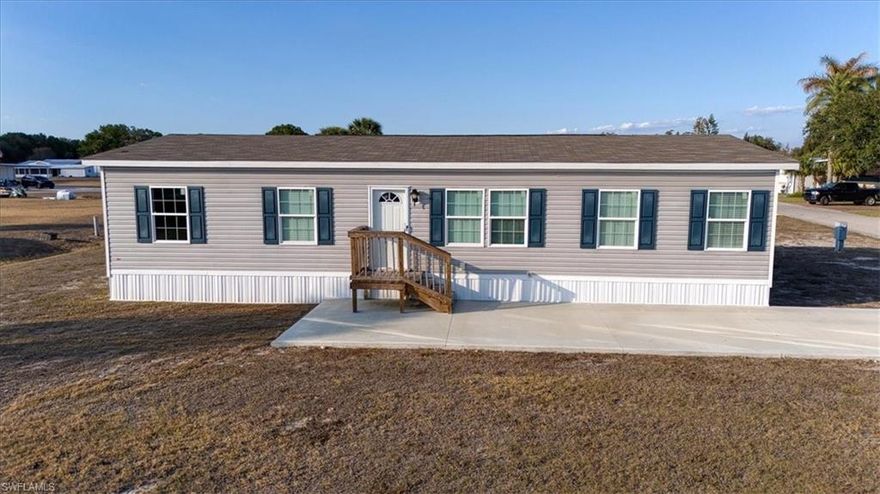 Welcome to your slice of paradise in this 55+ desirable Moore Haven Yacht Club riverside community, this charming mobile home offers the perfect blend of comfort and convince of being right next to the Caloosahatchee River. Enjoy peaceful mornings and breathtaking sunsets all within steps from your front door. Moore Haven Yacht club is a well-maintained friendly river and boating community that provides easy access to the Caloosahatchee River and lake Okeechobee where some of the world's best bass fishing is done. Inside this 2024 manufactured home you will find a spacious bright and inviting 3-bedroom 2 bath complete with all new top of the line range, dishwasher, refrigerator and functionable kitchen with comfortable living spaces designed for easy living. whether you are looking for a seasonal retreat or a full-time residence this home offers a prime waterside location with low HOA fees. Come take a peek and see what Moore haven yacht club is all about. I promise, you will want to pack your bags and move in.