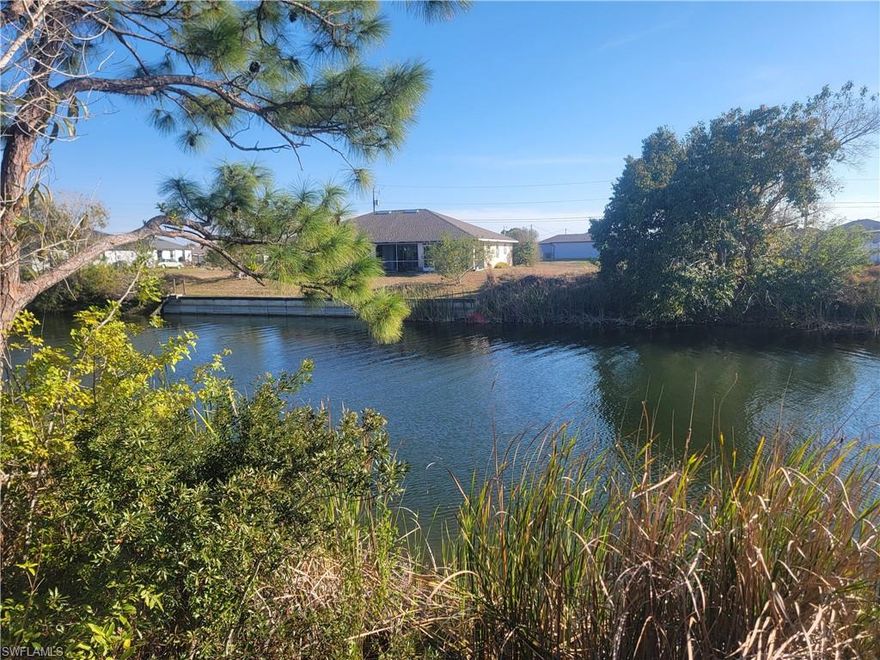 This .23-acre vacant residential freshwater lot with southern rear exposure, offering both tranquility and convenience, making it an ideal location for your future waterfront home. With future access to city water and sewer, this lot provides excellent building potential. Don't miss out on this fantastic investment opportunitity.  No protected species (no gopher tortoises, eagles, burrowing owls) on this site as of listing date.