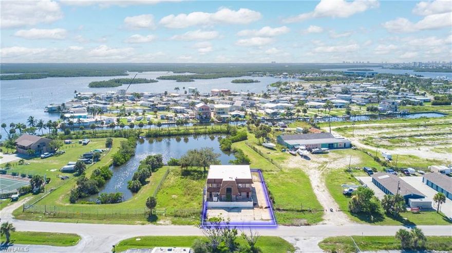 This Commercial Mix Use Property is Located on San Carlos Island the Gateway Island to and from Fort Myers Beach. On a side street that runs parallel with San Carlos Blvd. between the bridges so it's easy quick access to the Bridge and FMB area.